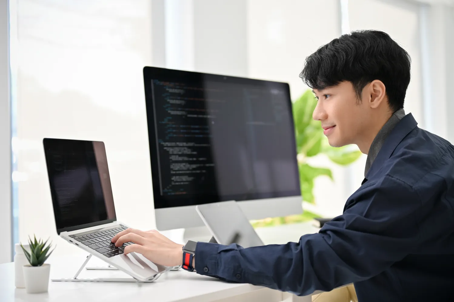 Developer working in modern global office